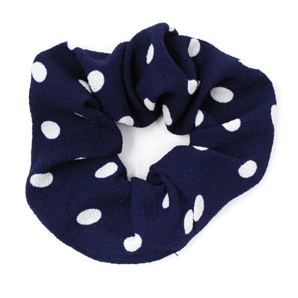 Satiny polka dot soft fabric scrunchie