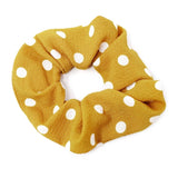 Satiny polka dot soft fabric scrunchie