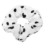 Satiny polka dot soft fabric scrunchie